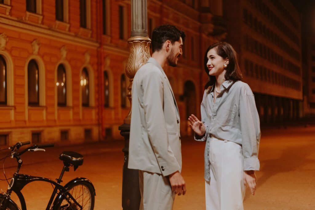 Hands gesturing while learning things to talk to your crush effectively using casual communication skills. 
