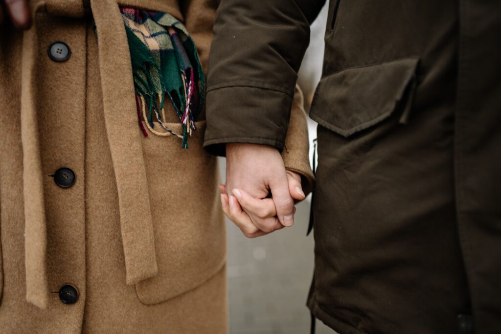 What Are the Bases in Dating? Consent & Boundaries Explained (2026) A couple holding hands, learning to navigate the relationship stages with respect and what are the bases in dating.