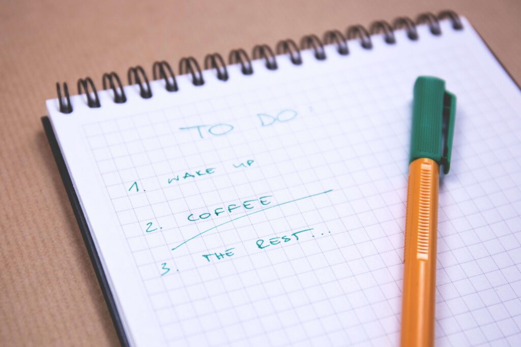 A checklist notebook outlining daily steps for healing emotional wounds over time. 
