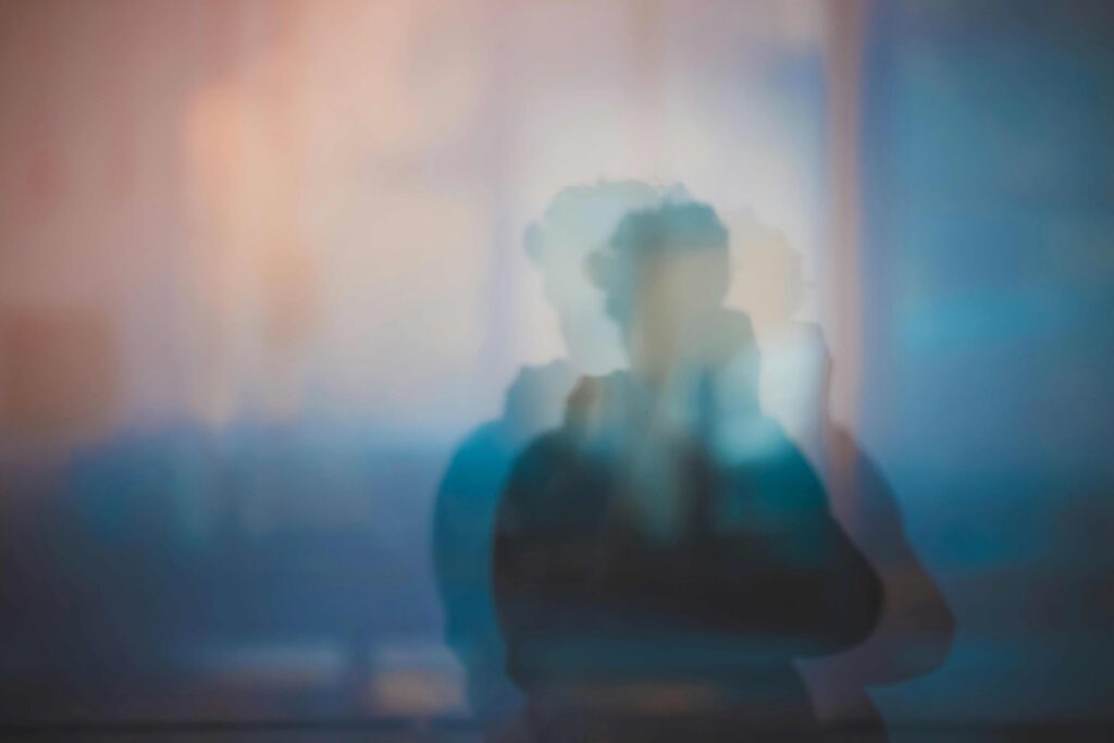 Identity Foreclosure: 5 Signs You Are Lost in Marriage & How to Heal A blurry silhouette representing identity foreclosure and losing personal self in marriage.