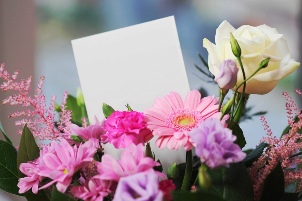 A blank greeting card in a flower bouquet for love poems for her milestones. 