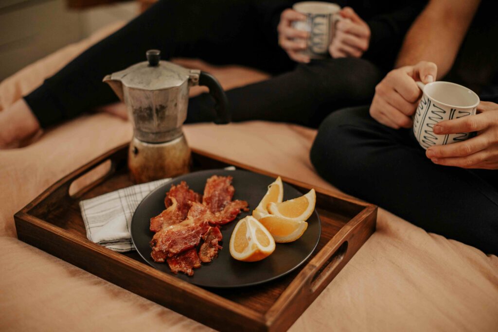 A couple enjoying morning breakfast and coffee sharing relationship intellectual profiles.