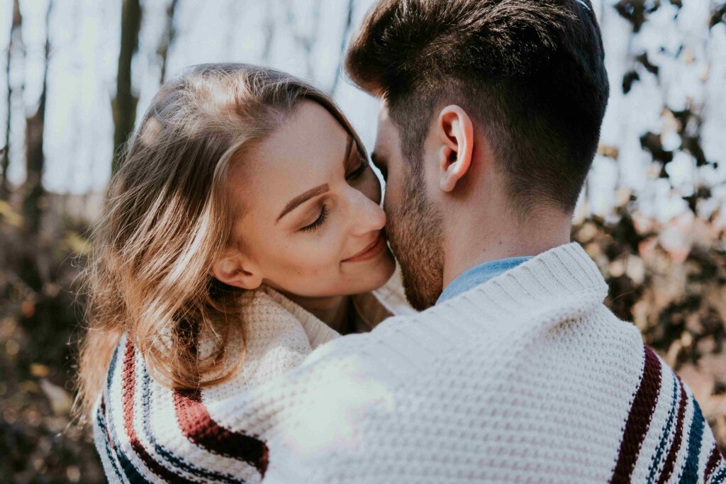 Reasons to Love Someone: 15 Beautiful Truths About Connection A couple embracing gently outdoors representing genuine reasons to love someone.