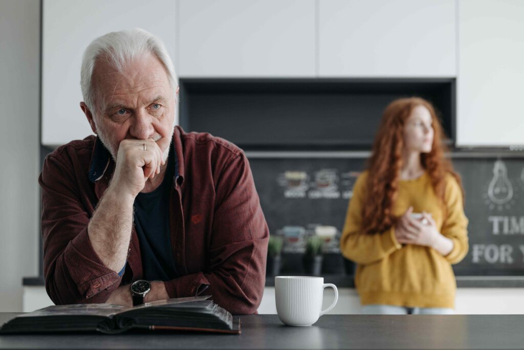 Toxic Parents: 9 Signs You Must Set Firm Boundaries Today An older father and daughter showing generational tension and toxic parents dynamics.