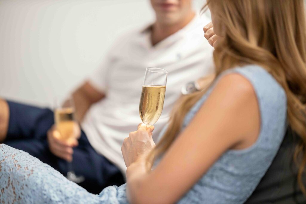Speed Dating: The Psychology of Making an Instant Connection Two people having a champagne toast representing speed dating and instant connection.
